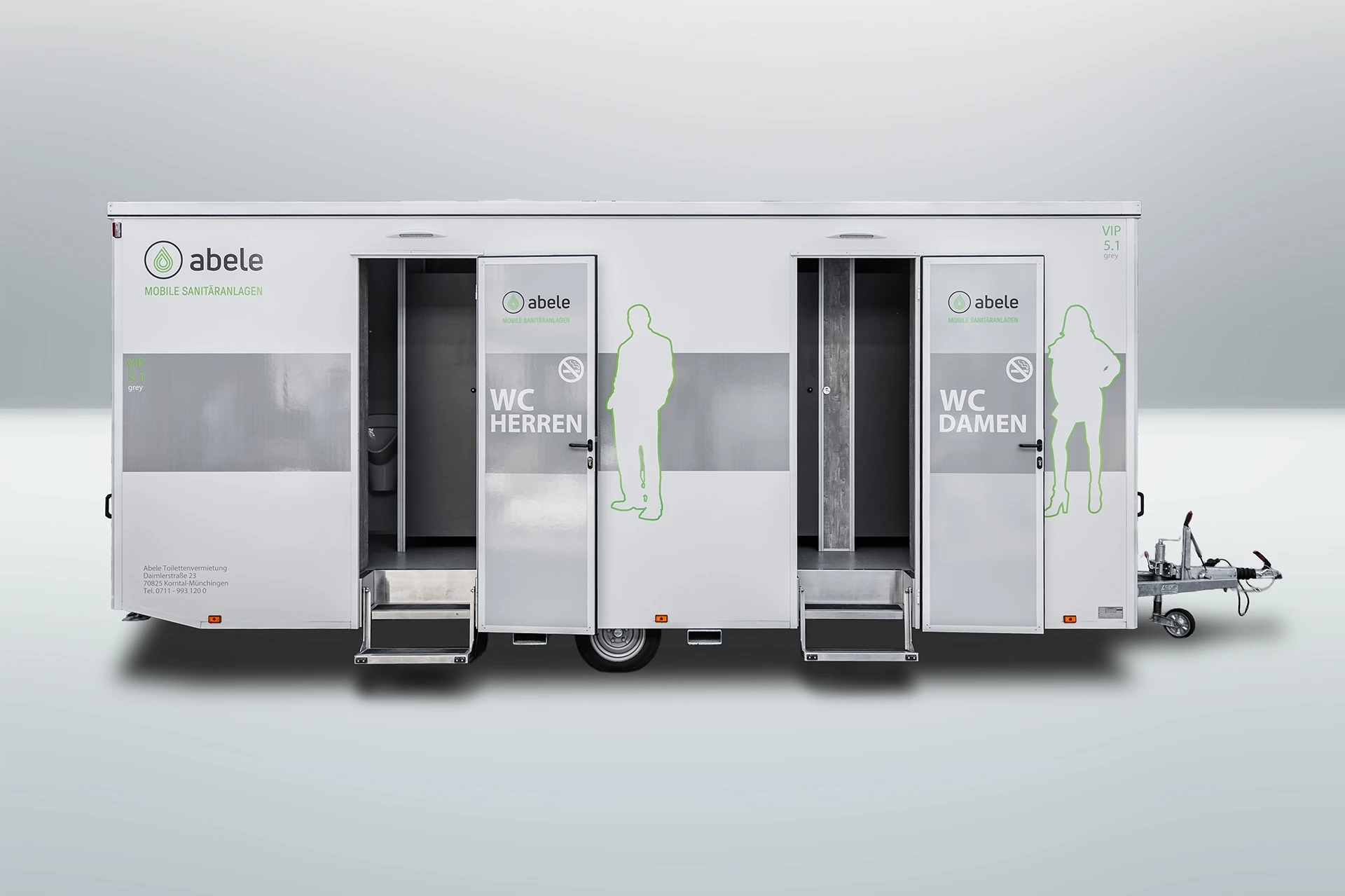 Toilettenwagen Modell Exklusiv – GoGrey 3 Mobiler Toilettenanhänger mit separaten Eingängen für Herren und Damen, markiert durch Silhouetten und Beschriftungen.