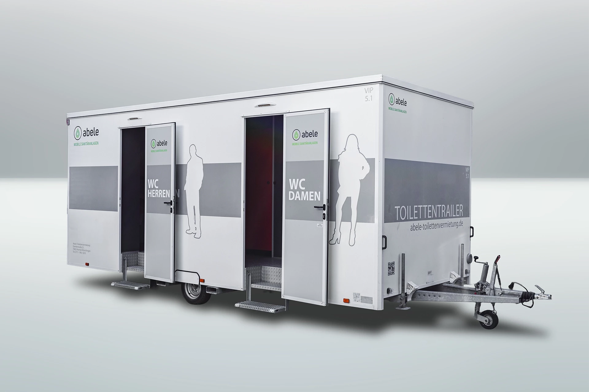 Toilettenwagen Modell Exklusiv – Mix 5/1 9 Moderner Toilettentrailer mit separaten Eingängen für Damen und Herren, markiert mit Piktogrammen auf den Türen.