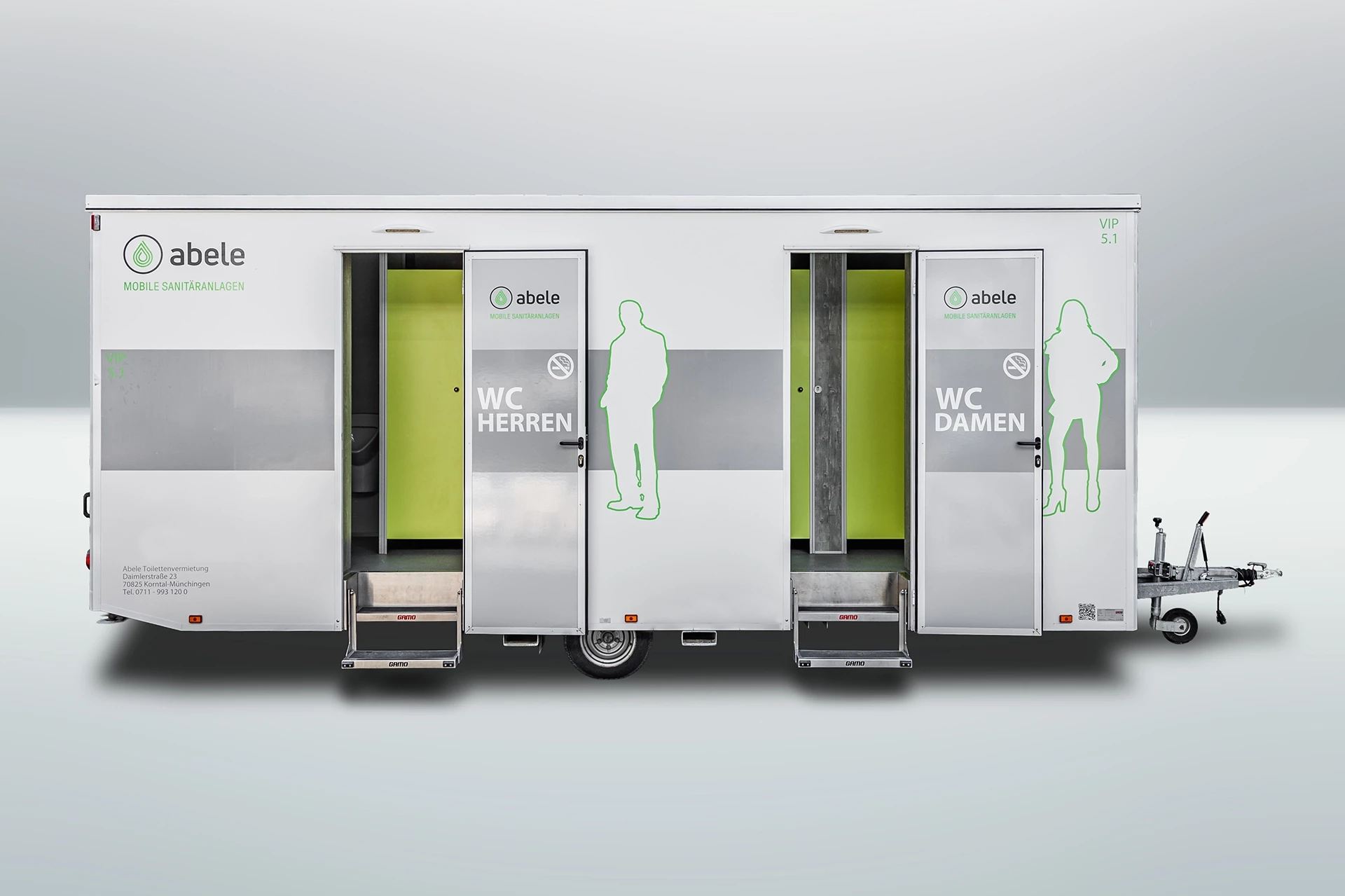 Luxus Toilettenwagen Modell Exklusiv – GoGreen 10 Mobiler Sanitärcontainer mit getrennten Eingängen für Damen und Herren, markiert durch Silhouetten und Beschriftungen.