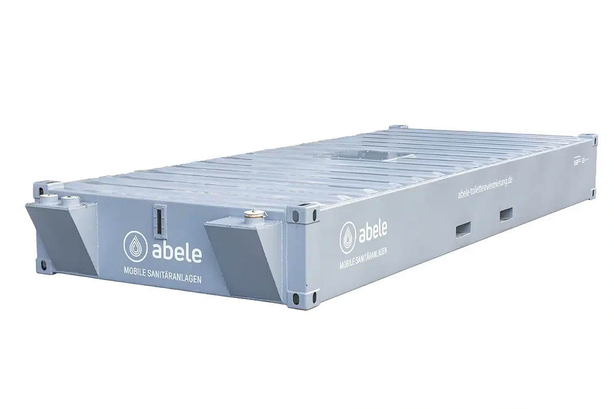 Grauer, flacher Sanitärcontainer mit „abele“-Logo und Website, geeignet für mobile Anwendungen.